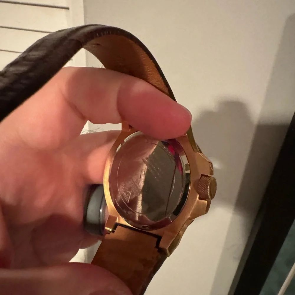 Guess men’s gold brown leather watch